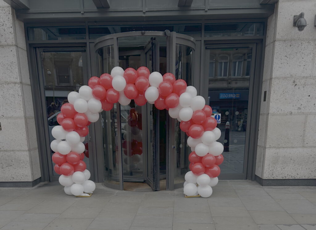 Red & White Rounded Balloon Arch for Hotel Entrance in London